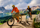 Couple Cycling in Dolomite Alps